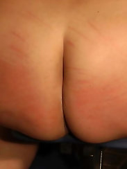 Spanking marks on the plump arse